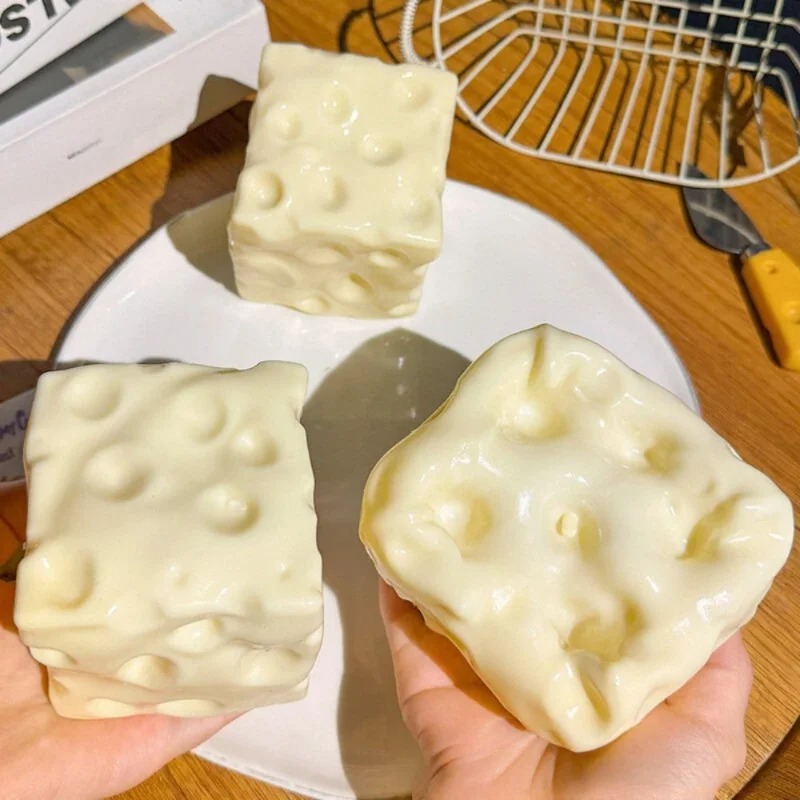 Taba Squishy Cheese Cube Stres - đánh giá và giá Fidget Cube Original